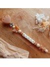 Attache sucette personnalisée en silicone, coeur paillette beige papillon noeud nude, prénom enfant.