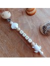 Attache sucette personnalisée en silicone,  Coquillage-tortue beige-blanc, prénom.