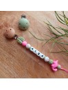 Attache sucette personnalisée en silicone, animaux dinosaure rose, prénom enfant.